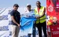 Jeff Kuria poses for a photo while giving out merchandise during the Jeff Kuria tournament in Kiambu County.